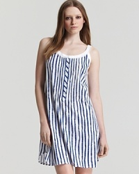 An adorable striped sleeveless knit gown with scalloped edge lace trim and flower shaped buttons.