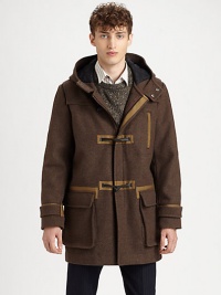 A cold weather staple offers modern attributes, featuring an attached hood, front toggle closure and contrasting trim, and is crafted in a luxurious wool blend for superior warmth and comfort.Zip frontToggle button closureAttached hoodChest welt, hip flap pocketsAbout 35 from shoulder to hem60% wool/20% polyester/15% nylon/5% other fibersDry cleanImported A cold weather staple offers modern attributes, featuring an attached hood, front toggle closure and contrasting trim, and is crafted in a luxurious wool blend for superior warmth and comfort.Zip frontToggle button closureAttached hoodChest welt, hip flap pocketsAbout 35 from shoulder to hem60% wool/20% polyester/15% nylon/5% other fibersDry cleanImported
