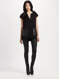 Try to resist this twill tunic with fashion-forward leather pockets and a relaxed-yet-flattering fit.V-necklineCap sleevesLeather patch pocketsAbout 28 from shoulder to hemBody: 75% viscose/21% nylon/4% elastanePockets: lambskin leatherDry clean by leather specialistImported Model shown is 5'9 (175cm) wearing US size Small. Try to resist this twill tunic with fashion-forward leather pockets and a relaxed-yet-flattering fit.V-necklineCap sleevesLeather patch pocketsAbout 28 from shoulder to hemBody: 75% viscose/21% nylon/4% elastanePockets: lambskin leatherDry clean by leather specialistImported Model shown is 5'9 (175cm) wearing US size Small.