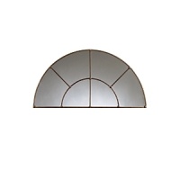 With its unique shape and beautiful details this half-moon mirror mimics a window, adding depth to a room. With its unique shape and beautiful details this half-moon mirror mimics a window, adding depth to a room.