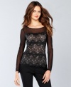 Whether it's date night or holiday party, INC's sheer illusion petite lace top makes a stylish, sophisticated statement!