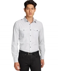 Epaulets and a subtle striped pattern give this Kenneth Cole New York button down a cool modern style. Epaulets and a subtle striped pattern give this Kenneth Cole New York button down a cool modern style.