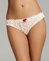 Sweet and sultry combine in Elle Macpherson's lace trimmed bikini with heart dot print.