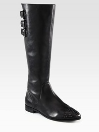 Grommet detailing adds edgy-chic style to this tall leather silhouette with adjustable buckle straps. Stacked heel, 1 (25mm)Shaft, 15½Leg circumference, 14Leather upperSide zipAdjustable buckle strapsLeather lining and solePadded insoleImported Grommet detailing adds edgy-chic style to this tall leather silhouette with adjustable buckle straps. Stacked heel, 1 (25mm)Shaft, 15½Leg circumference, 14Leather upperSide zipAdjustable buckle strapsLeather lining and solePadded insoleImported