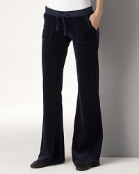 Juicy Couture super-cute and comfortable velour pants have side and back snap pockets, perfect for keeping your essentials. Banded waist with drawstring. SHOP ALL COLORS Juicy Couture super-cute and comfortable velour pants have side and back snap pockets, perfect for keeping your essentials. Banded waist with drawstring. SHOP ALL COLORS