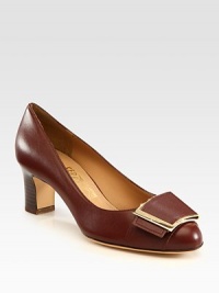 Timeless design of soft Italian leather, finished with a logo-detailed bow and stacked heel. Stacked heel, 2¼ (60mm)Leather upperLeather lining and solePadded insoleMade in Italy Timeless design of soft Italian leather, finished with a logo-detailed bow and stacked heel. Stacked heel, 2¼ (60mm)Leather upperLeather lining and solePadded insoleMade in Italy