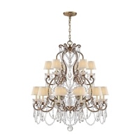 Glamour radiates from this medium-sized Ralph Lauren chandelabra, featuring eighteen bulbs topped with petite silk shades and draped with dazzling crystals.
