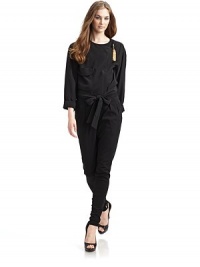 THE LOOKAsymmetrical zip front with golden fringe pull & hidden snapsLong sleeves with roll cuffsSingle patch pocketTie-waist with elastic backDual flap pocketsTHE FITAbout 20 from shoulder to hemTHE MATERIAL77% acetate/23% silkFully linedCARE & ORIGINDry cleanMade in Italy THE LOOKAsymmetrical zip front with golden fringe pull & hidden snapsLong sleeves with roll cuffsSingle patch pocketTie-waist with elastic backDual flap pocketsTHE FITAbout 20 from shoulder to hemTHE MATERIAL77% acetate/23% silkFully linedCARE & ORIGINDry cleanMade in Italy