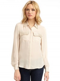 THE LOOKShirt collar with beaded detailsConcealed front button closureLong button cuff sleeves Beaded chest flap pocketsTHE FITAbout 25 from shoulder to hemTHE MATERIALSilkCARE & ORIGINDry cleanImportedModel shown is 5'10 (177cm) wearing US size Small. THE LOOKShirt collar with beaded detailsConcealed front button closureLong button cuff sleeves Beaded chest flap pocketsTHE FITAbout 25 from shoulder to hemTHE MATERIALSilkCARE & ORIGINDry cleanImportedModel shown is 5'10 (177cm) wearing US size Small.