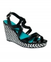 Walk with some pep in your step. The Allyssa sandal by Style&co. flirts with funkiness, a woven wedge and wavy straps.
