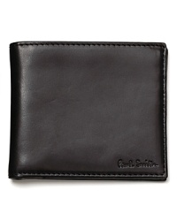 Soft refined leather on the exterior gives way to the flashy metallic-like bronze interior, a unique play on the color of money by Paul Smith. Soft refined leather on the exterior gives way to the flashy metallic-like bronze interior, a unique play on the color of money by Paul Smith.