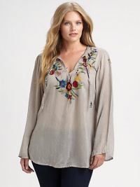 Vibrant embroidery decorates this ethereal design offering you classic arm coverage and a relaxed-yet-feminine fit.Self-tie detail at necklineLong sleevesEmbroidered detailsAbout 29 from shoulder to hemRayonMachine washImported Vibrant embroidery decorates this ethereal design offering you classic arm coverage and a relaxed-yet-feminine fit.Self-tie detail at necklineLong sleevesEmbroidered detailsAbout 29 from shoulder to hemRayonMachine washImported