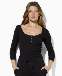 A classic waffle-knit cotton Henley channels chic, casual style with three-quarter sleeves and sleek hardware. A classic waffle-knit cotton Henley channels chic, casual style with three-quarter sleeves and sleek hardware.