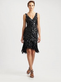 Shimmering beaded fringe creates an exquisite-looking dress that will certainly stand out from the crowd.Deep v-necklineSleevelessAllover sequinsHi-lo hemConcealed back zipperFully linedAbout 25 from natural waistNylonSpot cleanImported Model shown is 5'10 (177cm) wearing US size 4. Shimmering beaded fringe creates an exquisite-looking dress that will certainly stand out from the crowd.Deep v-necklineSleevelessAllover sequinsHi-lo hemConcealed back zipperFully linedAbout 25 from natural waistNylonSpot cleanImported Model shown is 5'10 (177cm) wearing US size 4.