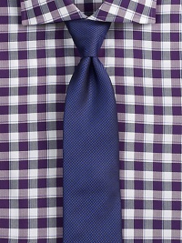 An impeccable houndstooth print adds a distinguished finish to your suiting essentials.About 3 wideSilkDry cleanMade in Italy An impeccable houndstooth print adds a distinguished finish to your suiting essentials.About 3 wideSilkDry cleanMade in Italy