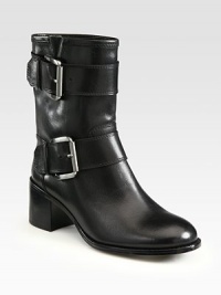 A stacked heel and double adjustable buckles add flair to a sleek leather design. Stacked heel,2 (50mm)Leather upperPull-on styleLeather liningRubber solePadded insoleImported A stacked heel and double adjustable buckles add flair to a sleek leather design. Stacked heel,2 (50mm)Leather upperPull-on styleLeather liningRubber solePadded insoleImported