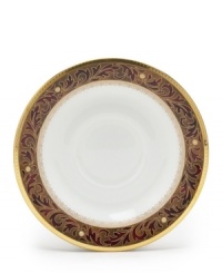 Add drama to your tabletop with this bold pattern from Noritake! Strikingly elegant, this bone china features a rich gold and red brocade border adorned with soft ivory dots and a gold band. Add drama to your tabletop with this bold pattern from Noritake! Strikingly elegant, this bone china features a rich gold and red brocade border adorned with soft ivory dots and a gold band.