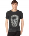 A unique skull graphic gives this Calvin Klein Jeans tee its edgy style.