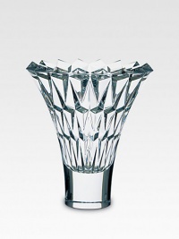 A beautiful crystal vase is handcrafted with a smooth base and diamond-cut facets along the wide, open neck. From the Tornado Collection Full-lead crystal 10 high Hand wash Made in France A beautiful crystal vase is handcrafted with a smooth base and diamond-cut facets along the wide, open neck. From the Tornado Collection Full-lead crystal 10 high Hand wash Made in France