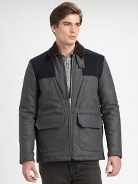 Made from fine Italian fabrication, this jacket offers a unique take on on-trend mixed media.Corduroy collarZipper frontOversized patch pocketsQuilted details on front and backAbout 30 from shoulder to hem70% wool/20% nylon/10% cashmere; cotton liningDry cleanImported of Italian fabric
