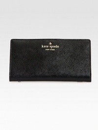 Beautifully textured leather with a lovely logo emblem.Snap button tab closureOne outside zip pocketThirteen credit card slotsFour open compartmentsFully lined6¾W X 3½H X ½DImported Beautifully textured leather with a lovely logo emblem.Snap button tab closureOne outside zip pocketThirteen credit card slotsFour open compartmentsFully lined6¾W X 3½H X ½DImported