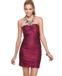 A rhinestone-rich halter neck and curve-hugging metallic fabric are striking details that make this frock from Hailey Logan the 'it dress' of the year! A rhinestone-rich halter neck and curve-hugging metallic fabric are striking details that make this frock from Hailey Logan the 'it dress' of the year!