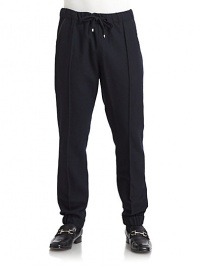 THE LOOKElastic waistband with drawstring closureSide slash pockets with leather pipingGathered elastic cuffsBack flap pocketTHE FITRise, about 12Inseam, about 30THE MATERIAL63% wool/37% cottonCARE & ORIGINDry cleanMade in Italy THE LOOKElastic waistband with drawstring closureSide slash pockets with leather pipingGathered elastic cuffsBack flap pocketTHE FITRise, about 12Inseam, about 30THE MATERIAL63% wool/37% cottonCARE & ORIGINDry cleanMade in Italy