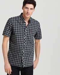 Subtle details like the offset placket and a split back yoke offer unique designer flair on this short-sleeve button-down you'll reach for again and again. Subtle details like the offset placket and a split back yoke offer unique designer flair on this short-sleeve button-down you'll reach for again and again.