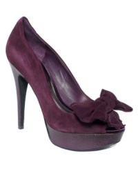 GUESS by Marciano's Kaipo platform pumps give you the best of everything suede. From the smooth upper to the pretty bow with stitched detailing that rests at the toe. GUESS by Marciano's Kaipo platform pumps give you the best of everything suede. From the smooth upper to the pretty bow with stitched detailing that rests at the toe.