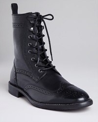 The classic wing tip climbs high with the Syracuse Wing Tip Dress Boots from Gordon Rush. The classic wing tip climbs high with the Syracuse Wing Tip Dress Boots from Gordon Rush.