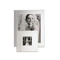 Always chic and witty, Kate Spade silverplated frames are another example of her classic, but trendy gifts. The Library Stripe Frames are characterized by etched vertical stripes down the left side of the frames. Available in 3 sizes: 3x3; 4x6; and 8x10. Always chic and witty, Kate Spade silverplated frames are another example of her classic, but trendy gifts. The Library Stripe Frames are characterized by etched vertical stripes down the left side of the frames. Available in 3 sizes: 3x3; 4x6; and 8x10.