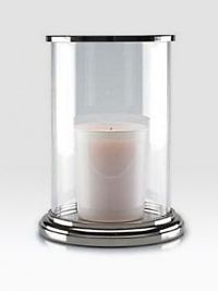 Gleaming glass and polished nickel is crafted to house a single pillar candle for a beautiful, ethereal effect.5¾ L x 8 HGlass and nickelImported