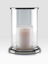 Gleaming glass and polished nickel is crafted to house a single pillar candle for a beautiful, ethereal effect.5¾ L x 8 HGlass and nickelImported