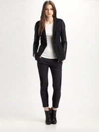 Lightweight cotton twill blazer with luminous leather sleeves and zippered cuffs. Notched lapelLong leather sleeves with zippered cuffsButton frontFront flap pocketsBack ventAbout 27 from shoulder to hemBody: Cotton; Contrast: LeatherDry clean with leather specialistImportedModel shown is 5'10 (177cm) wearing US size 2. Lightweight cotton twill blazer with luminous leather sleeves and zippered cuffs. Notched lapelLong leather sleeves with zippered cuffsButton frontFront flap pocketsBack ventAbout 27 from shoulder to hemBody: Cotton; Contrast: LeatherDry clean with leather specialistImportedModel shown is 5'10 (177cm) wearing US size 2.