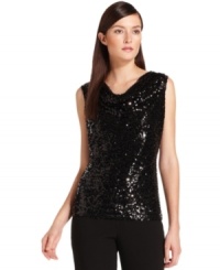 Calvin Klein's sequined top will add the perfect dose of shimmer to a special ensemble. Calvin Klein's sequined top will add the perfect dose of shimmer to a special ensemble.