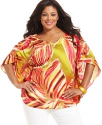 Liven up your causal look with J Jones New York's batwing sleeve plus size top, showcasing a tropical print. (Clearance) Liven up your causal look with J Jones New York's batwing sleeve plus size top, showcasing a tropical print. (Clearance)