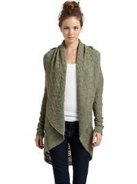 THE LOOKLightweight pointelle cashmere knitShawl collarDraped open frontLong sleeves with scallop cuffsCocoon silhouetteTHE FITAbout 30 from shoulder to hemTHE MATERIALCashmereCARE & ORIGINDry cleanImportedModel shown is 5'8 (173cm) wearing US size Small. THE LOOKLightweight pointelle cashmere knitShawl collarDraped open frontLong sleeves with scallop cuffsCocoon silhouetteTHE FITAbout 30 from shoulder to hemTHE MATERIALCashmereCARE & ORIGINDry cleanImportedModel shown is 5'8 (173cm) wearing US size Small.