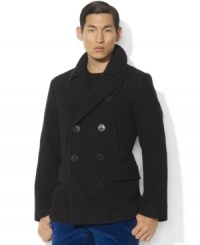Vertical zip pockets grant a classic pea coat modern appeal in a warm wool-blend construction. Vertical zip pockets grant a classic pea coat modern appeal in a warm wool-blend construction.