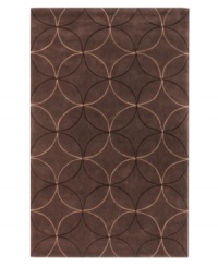 Interlocking circles create a lush geometric pattern that help shape any room on this rich brown area rug from Surya. Hand-tufted from poly-acrylic fibers that provide luxurious softness without shedding, this rug adds a striking, easy-maintenance accent to any living space. Interlocking circles create a lush geometric pattern that help shape any room on this rich brown area rug from Surya. Hand-tufted from poly-acrylic fibers that provide luxurious softness without shedding, this rug adds a striking, easy-maintenance accent to any living space.