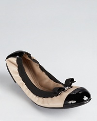 A timeless classic from Salvatore Ferragamo--the My Paris flats go everywhere and anywhere in an iconic beige and black colorway. A timeless classic from Salvatore Ferragamo--the My Paris flats go everywhere and anywhere in an iconic beige and black colorway.