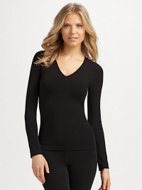 A fitted v-neck rendered in stretch, silky viscose for an utterly feminine look.About 24 from shoulder to hem Pullover style 73% viscose/21% nylon/6% elastene Hand wash Made in Italy A fitted v-neck rendered in stretch, silky viscose for an utterly feminine look.About 24 from shoulder to hem Pullover style 73% viscose/21% nylon/6% elastene Hand wash Made in Italy