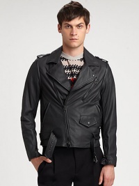 Made from butter-soft Italian leather, this edgy jacket offers style versatility, thanks to its detachable sleeves.Notched collarDetachable sleevesEpaulettesAsymmetrical zipper detailsChest and slash pocketsAbout 25 from shoulder to hemLambskinDry clean by leather specialistImported of Italian fabric Made from butter-soft Italian leather, this edgy jacket offers style versatility, thanks to its detachable sleeves.Notched collarDetachable sleevesEpaulettesAsymmetrical zipper detailsChest and slash pocketsAbout 25 from shoulder to hemLambskinDry clean by leather specialistImported of Italian fabric