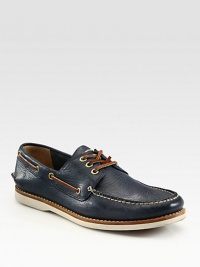 Traditional boat-shoe styling with the Frye combination of ruggedness and refinement, in rich leather.Leather upperTopstitch detailLeather liningPadded insoleRubber soleImported Traditional boat-shoe styling with the Frye combination of ruggedness and refinement, in rich leather.Leather upperTopstitch detailLeather liningPadded insoleRubber soleImported