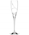 A fanciful cut pattern contrasts the timeless form of this Adorn flute from the Lenox crystal stemware collection.