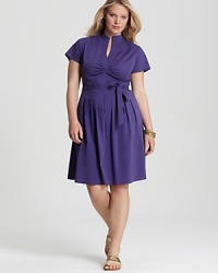 Pairing a fit-and-flare silhouette with a peppy purple hue, this Tahari Woman Plus dress lends a playful spirit to your daily look. Finish the style with printed flats and quirky bangles for eclectic charm. Pairing a fit-and-flare silhouette with a peppy purple hue, this Tahari Woman Plus dress lends a playful spirit to your daily look. Finish the style with printed flats and quirky bangles for eclectic charm.