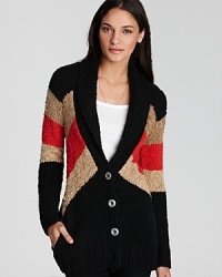 Striking color blocked details--the rage-worthy trend of fall--lends a bold look to this cozy knit Free People sweater. Striking color blocked details--the rage-worthy trend of fall--lends a bold look to this cozy knit Free People sweater.
