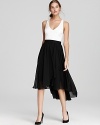 In a classic black and white palette, Aidan Mattox's color blocked dress lends femininity in an A-line silhouette.