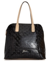 A pretty patent look that brings the shine. This sassy satchel from GUESS features a logo embossed exterior with glamorous gold-tone hardware and sleek contrast trim. A pretty patent look that brings the shine. This sassy satchel from GUESS features a logo embossed exterior with glamorous gold-tone hardware and sleek contrast trim.