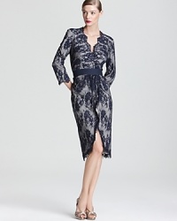 Sophistication meets romance in this Tadashi Shoji dress, complete with a waist-defining elastic belt for the finishing polish. Sophistication meets romance in this Tadashi Shoji dress, complete with a waist-defining elastic belt for the finishing polish.