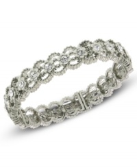 A lovely Victorian-inspired design by 2028. This stretch bracelet features shimmering glass crystal accents in an intricate setting. Crafted in silver tone mixed metal. Stretches to fit wrist. Approximate length: 7 inches. A lovely Victorian-inspired design by 2028. This stretch bracelet features shimmering glass crystal accents in an intricate setting. Crafted in silver tone mixed metal. Stretches to fit wrist. Approximate length: 7 inches.